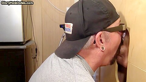 Gray DILF sucks and tugs gloryhole dick until spermed