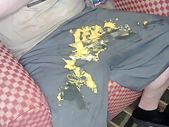 Having Some Hot Cheese Dip Using Nike Shorts For Bowl