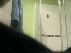 Hot Girl Spied Out Of The Shower, Drying Up And Singing