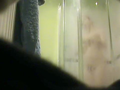 Hot Girl Spied Out Of The Shower, Drying Up And Singing