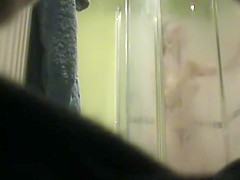 Hot Girl Spied Out Of The Shower, Drying Up And Singing