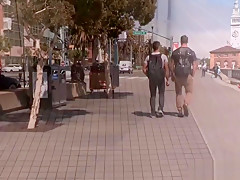Hot guy picking up and blowing off a muscular man on the bea