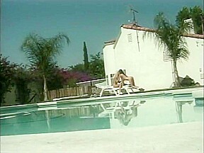 Hot lesbians have dildo fun by the pool