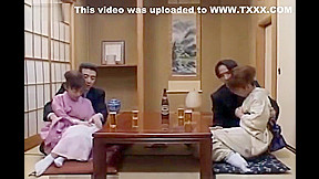 Japanese AV Model sticks cock in her cunt next to other couple