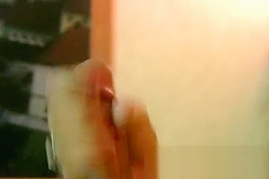 Ladyboy with big lips slips out of swimsuit and masturbates