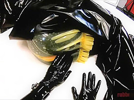 Latex sex with surprised beauty