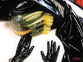Latex sex with surprised beauty