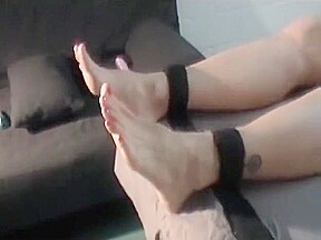 Laura's sexy size 12 feet tickled