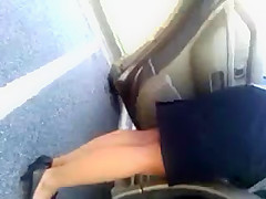 MILF upskirted in a parking lot