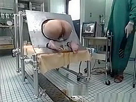 Milf Bound In A Machine And Takes An Enema In Her Ass