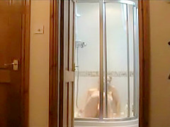 Milf spied masturbating in the shower