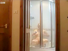 Milf spied masturbating in the shower