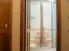 Milf spied masturbating in the shower