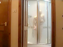 Milf spied masturbating in the shower