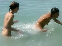 Naked brunette teens 18+ splash in the lake