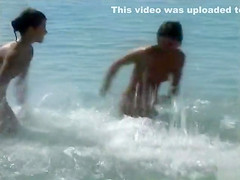 Naked brunette teens 18+ splash in the lake