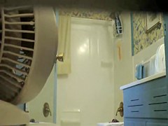 Nude wife is demonstrating big body with milk cans