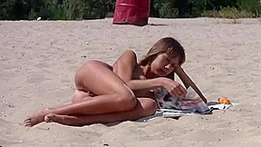 Nudist girl not shy about posing nude at the beach