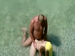 Nudist in yellow white fucked in beach