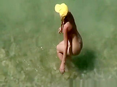 Nudist in yellow white fucked in beach