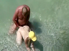 Nudist in yellow white fucked in beach