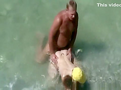 Nudist in yellow white fucked in beach