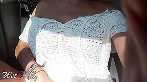 Real amateur girl masturbates in the car on the city streets