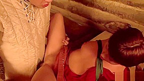 Redhead cutie plays with a long pecker