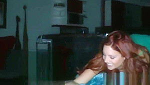 Redhead lesbian shares dildo with horny babe