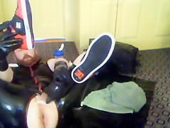 Rubber cub takes large inflatable butt plug