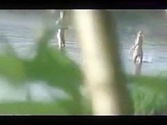 Russian couple on a wild beach