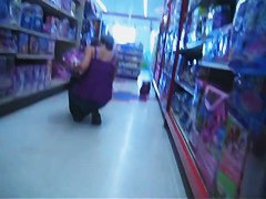 Sexy woman upskirt shot made in a department store