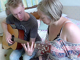 Shooting Starr Taking Guitar Lesson