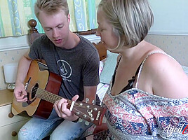 Shooting Starr Taking Guitar Lesson