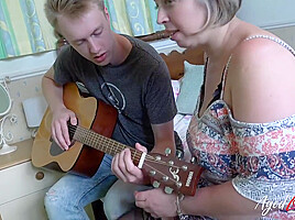 Shooting Starr Taking Guitar Lesson