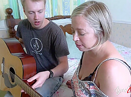 Shooting Starr Taking Guitar Lesson