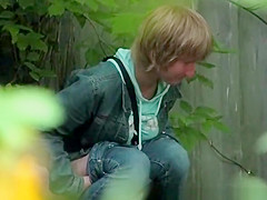 Short hair blonde caught peeing outdoors