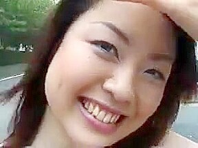 Shy japanese girl slowly gets naked in public