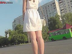 Skinny ass of young gal presented in oops upskirt act