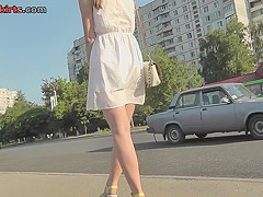 Skinny ass of young gal presented in oops upskirt act