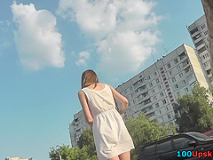 Skinny ass of young gal presented in oops upskirt act