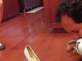Slave cleans shoes for Princess