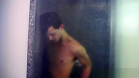 Sporty and horny twink Jessie getting steamy in the shower