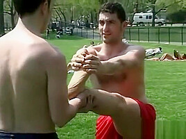 Sporty homos feet oiled up and tickled by his friends