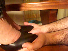 Stiletto Pumps Tramples hand closeup