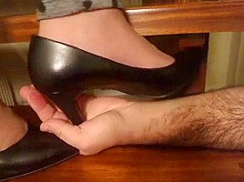 Stiletto Pumps Tramples hand closeup