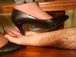 Stiletto Pumps Tramples hand closeup