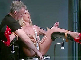 Strapped Busty Blonde In Gyno Chair Pussy Toyed
