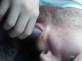 Sucking BBC in his car while he smokes a blunt