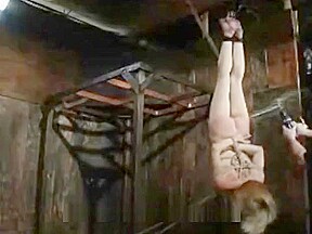 Tati Russo waxed, caned and manhandled in Bondage